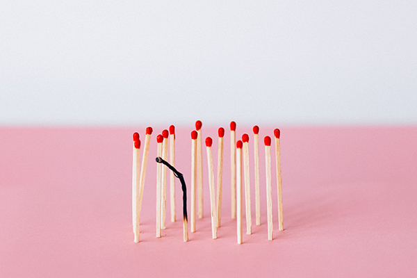 Matchsticks together with one burnt out